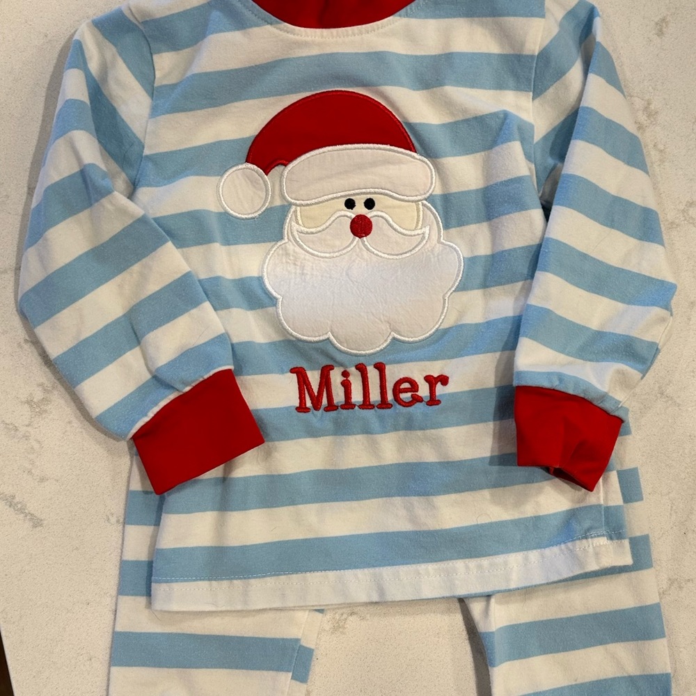 “Miller” Santa pajamas made by Smocking Bug